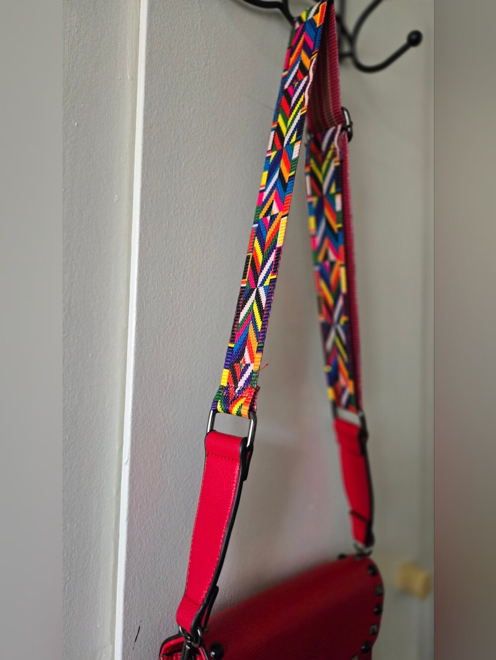 MERSI's coveted Ruby Red Studded Crossbody Bag with Multicolor Geo Strap - Picture 7 of 8